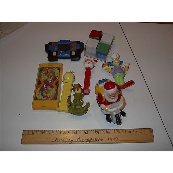 2 pez candy dispensers and assorted bag of toys