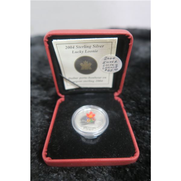 2004 Lucky Loonie Silver Dollar. A Lucky Loonie was secretly buried under the ice at the Salt Lake C
