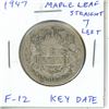 Image 1 : 1947 Maple Leaf Straight 7 Left Silver 50 Cents. Key Date. Mintage of 38,433 for both varieties. F-1