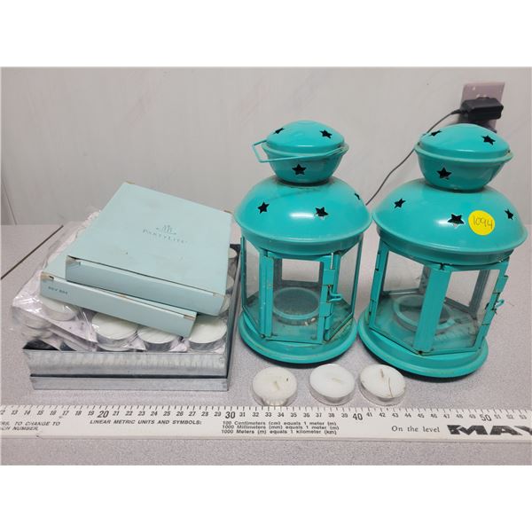 2 tea lightlanterns with lots of extra candles