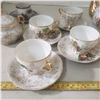 Image 2 : Tea set includes teapot, matchiing creamer and sugar with cups and saucers