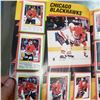 Image 12 : two NHL sticker books , partly filled