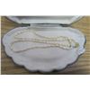 Image 2 : Seed pearl necklace in scalloped box