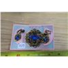 Image 1 : Pierced metal broach and earrings set with rhinestones, European design