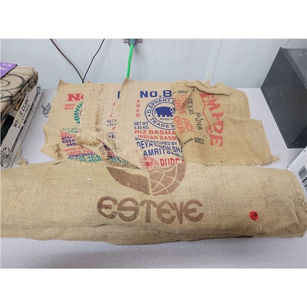 One large burlap sack and 5 small pieces of burlap