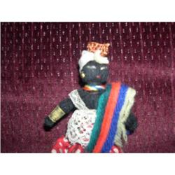 Black minature yarn doll #2211987