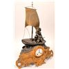 Image 1 : Clock with Boy on Boat and Apollo Sun God Sculpture  [129404]
