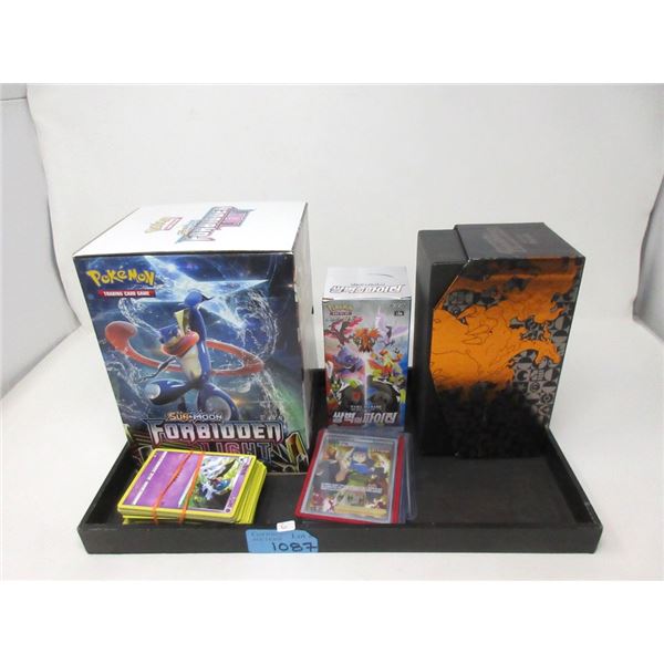 100 Assorted Pokemon Cards & 3 Empty Boxes