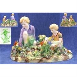 A Boy And Girl In A Garden Of Flowers  #2208148