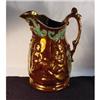 Image 1 : Large Relief Moulded Copper Lustre Jug. #2230894