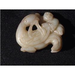 Qing period jade carving featuring a boy riding#2189448