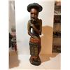 Image 2 : Wooden Sculpture of a Drummer 31" High and a Glass and wood hut. - 26" High.