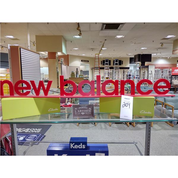 NEW BALANCE / CLARKS ADVERTISING LOT