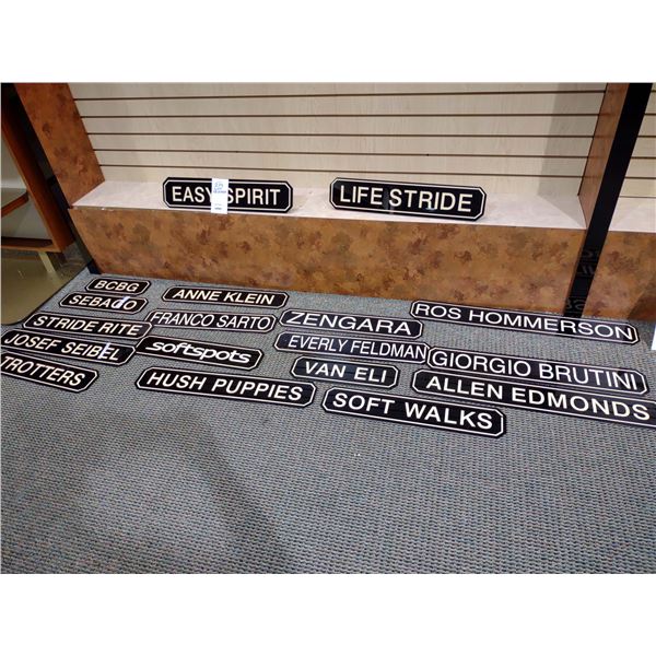 LOT OF 18 BLACK AND GOLD COLOR SHOE BRAND SIGNS, 13' - 33/5" LONG X 5" WIDE