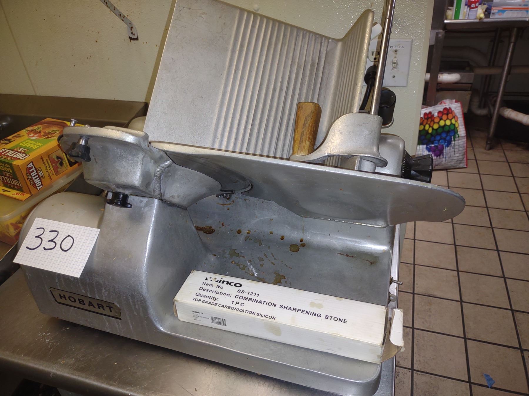 HOBART SLICER W/ SHARPENING STONE, RUNS, AKA LOT 330
