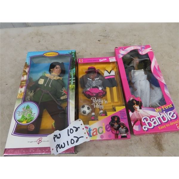 Collectible Barbie's In Packages & Scarecrow