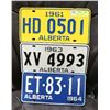 Image 1 : LOT OF 4 ALBERTA 1961, 63, 64 LICENSE PLATES