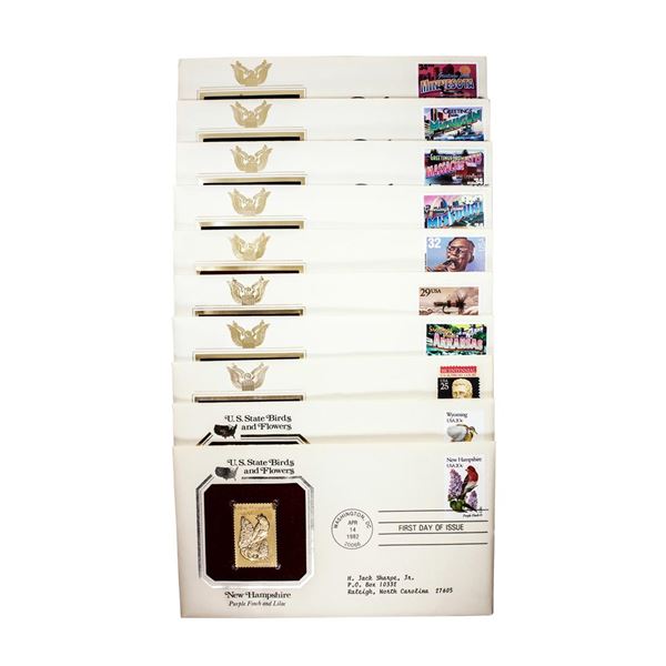 Lot of (10) First Day Of Issue 22KT Gold Replica Stamps in Envelopes