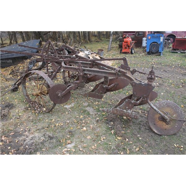 3 Bottom Plow W/ Steel Wheels