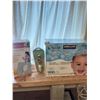 Image 1 : Case of baby wipes (brand new), Sunbeam heating pad, Snack Rabbit nesting utensils for kids)