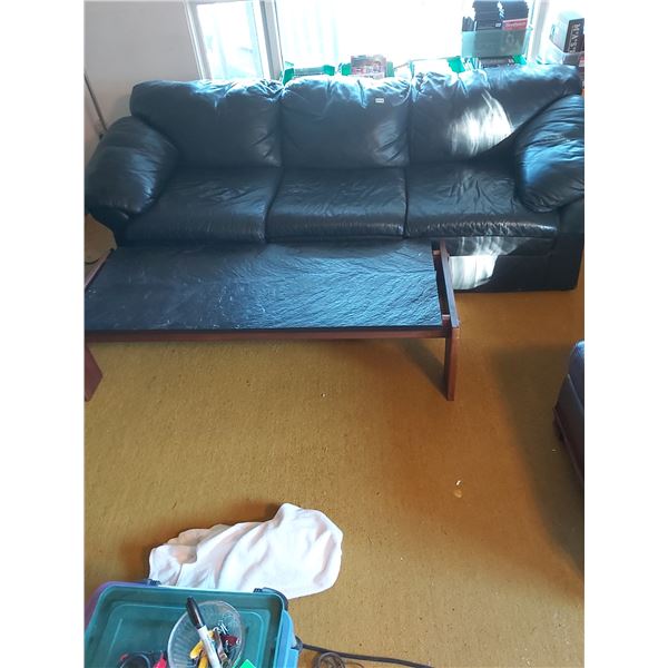 Black leather sofa with coffee table. Couch: 92" L, 38" D, 30" H. Table: 58.5" L, 22" D, 14" H
