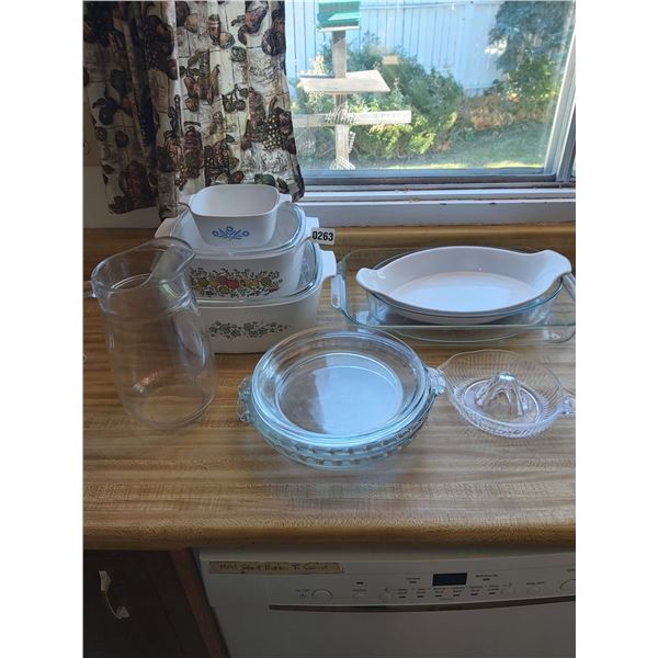 Asst Pyrex and ovenproof bakeware, lemon juicer, pie plates, glass pitcher