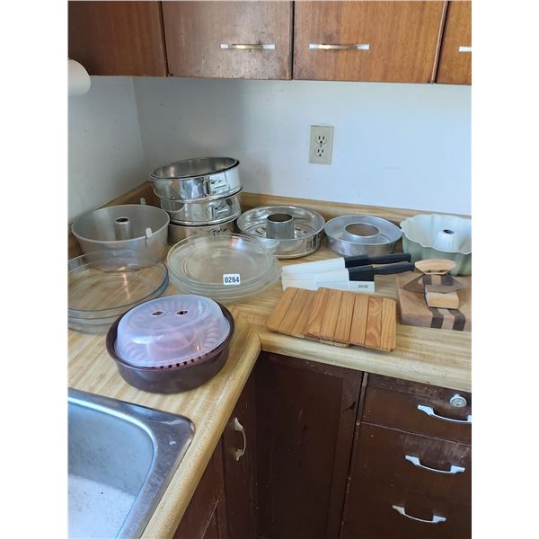 Asst kitchen dishes and utensils, springform pans, angel food cake pan, bundt pans, microwave bowl a