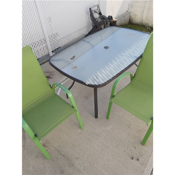 Glass-topped patio table and 2 green chairs (5' W, 38  T, 28.5  H)