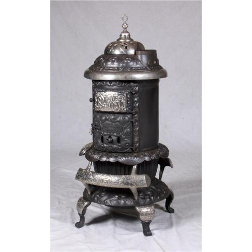 ANTIQUE CAST IRON & CHROME STOVE ROUND OAK