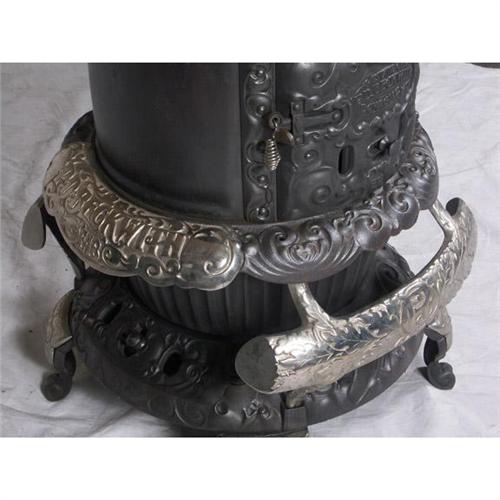 ANTIQUE CAST IRON & CHROME STOVE ROUND OAK