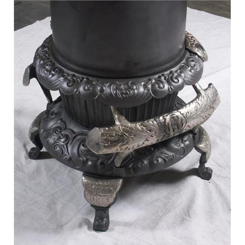 ANTIQUE CAST IRON & CHROME STOVE ROUND OAK