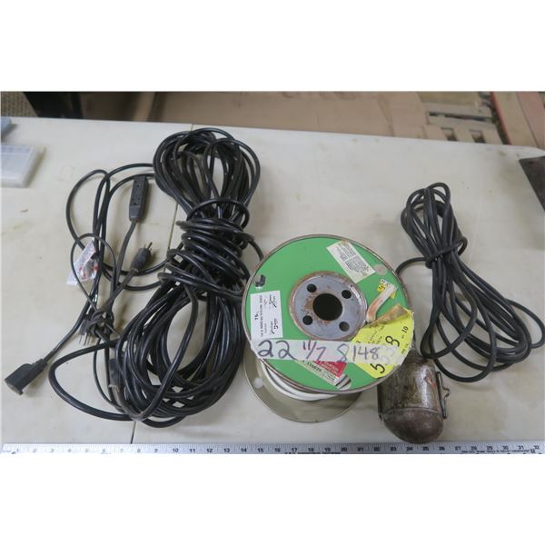 Roll of Electrical Wire, Extension Cords, and Trouble Light