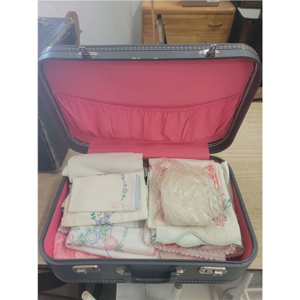 Suitcase of linens