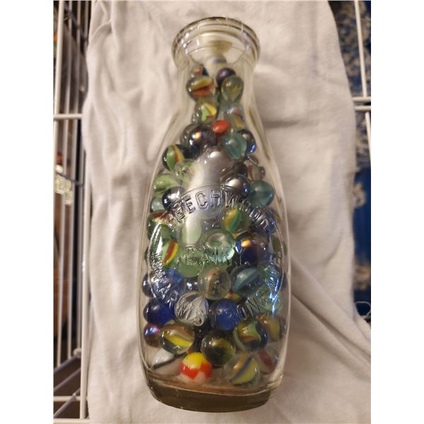 Beechwood Dairy milk bottle filled w/ marbles