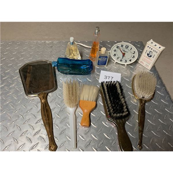 Vintage perfume bottles, old clock