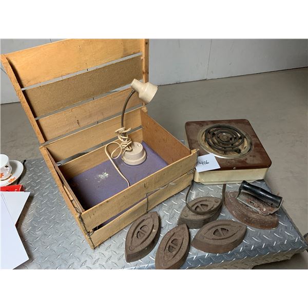 vintage irons, warming plate, light and orange crate
