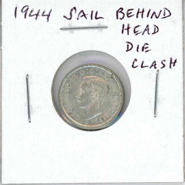 1944 Sail behind Head Canadian Silver 10 Cents. This error is the result of a major Die Clash. EF-40