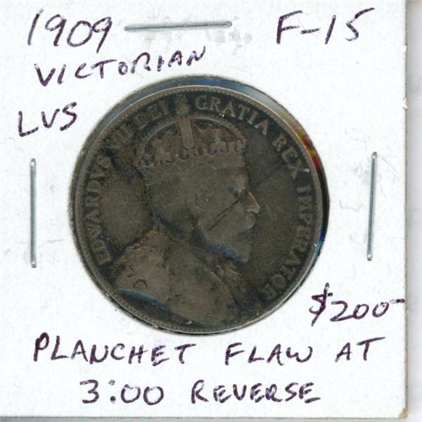 1909 Victorian Leaves Canadian Silver 50 Cents. The coin displays a Planchet Flaw on the reverse, th