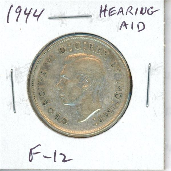1944 Hearing Aid Canadian Silver 50 Cents. The Hearing Aid visible in the king’s ear is the result o