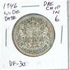 Image 1 : 1946 Wide Date Canadian Silver 50 Cents. The coin also displays a Die Chip in the 6 in the date. VF-