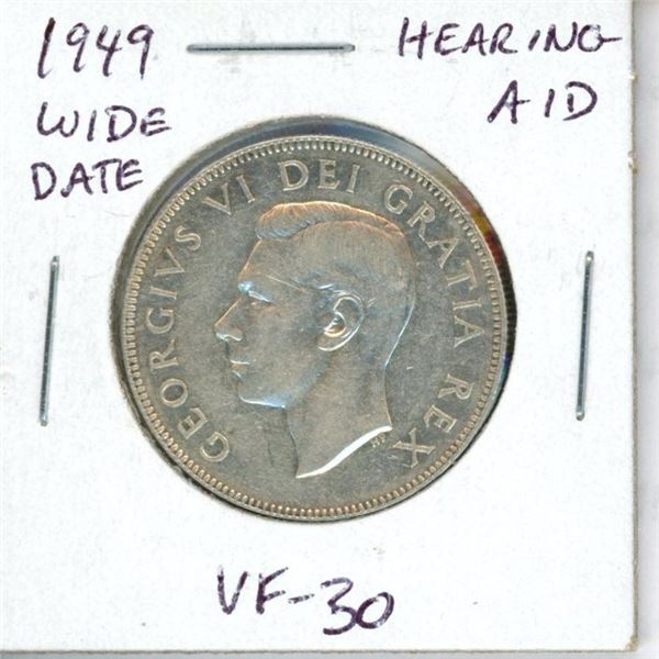 1949 Wide Date Canadian Silver 50 Cents. Hearing Aid in the King’s ear the result of a Die Clash. VF