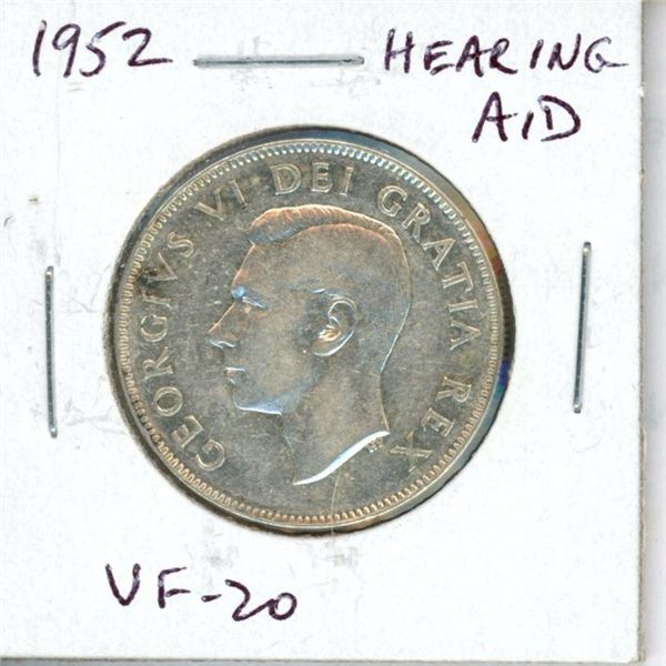 1952 Canadian Silver 50 Cents. Hearing Aid in King’s ear the result of a Die Clash. VF-20.