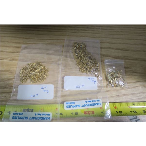 2 Gold Chains Over 50” and Charms