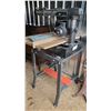 Image 1 : Radial Arm Saw - sitting on a stand