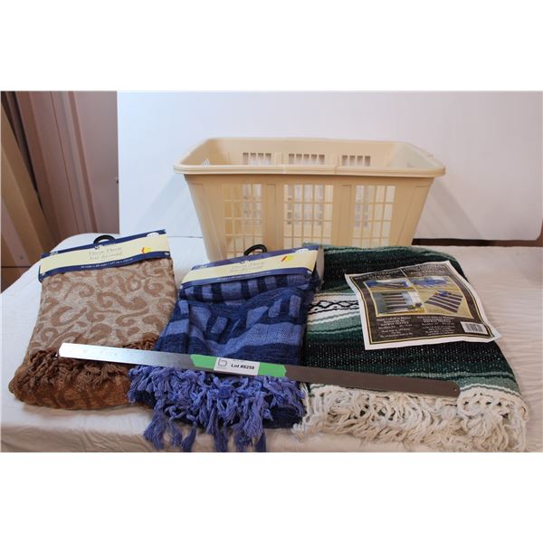 Throw blankets and laundry basket