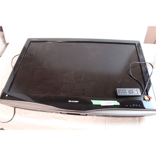 *37” Sharp TV, missing stand (not working)