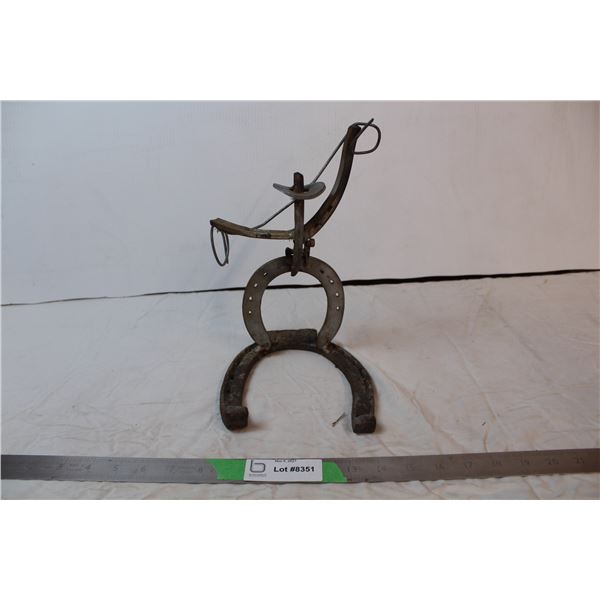 Cowboy decoration made from horse shoes