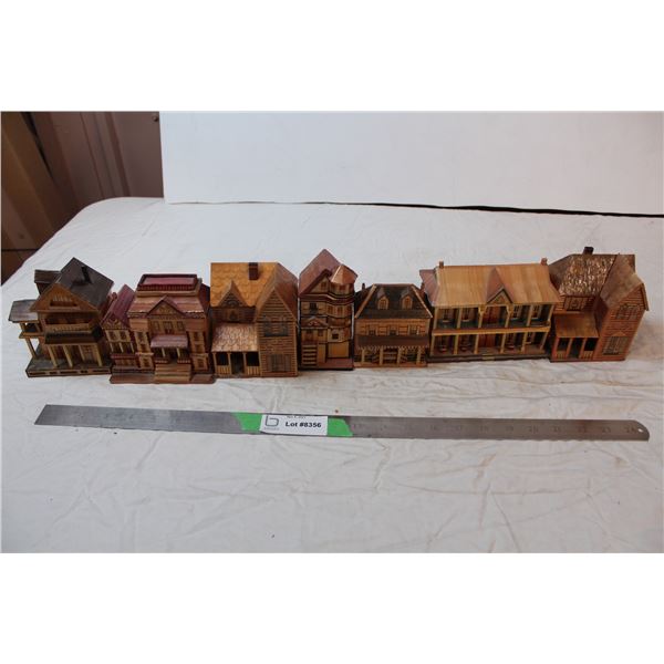 Minature house set made from wood and straw
