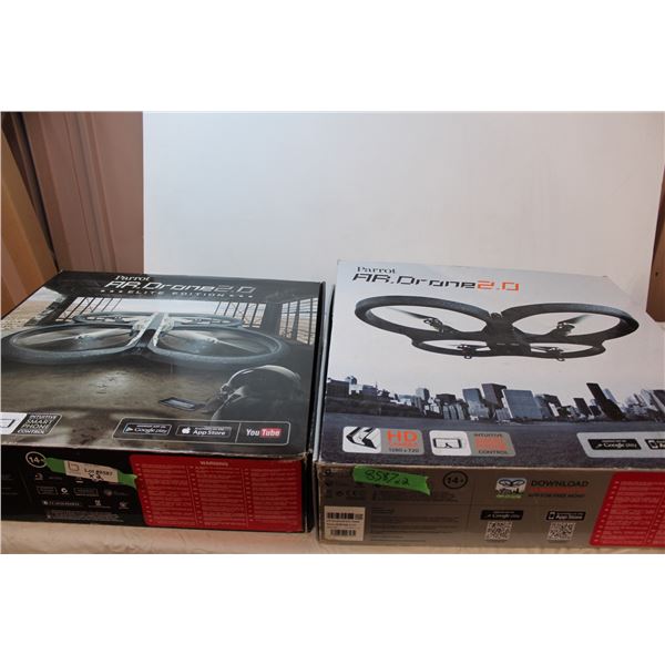 (2) Parrot drones - 1 looks to need repair / for parts - includes batteries, bodies, misc