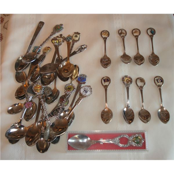 Souvenir spoons - 8 with charms